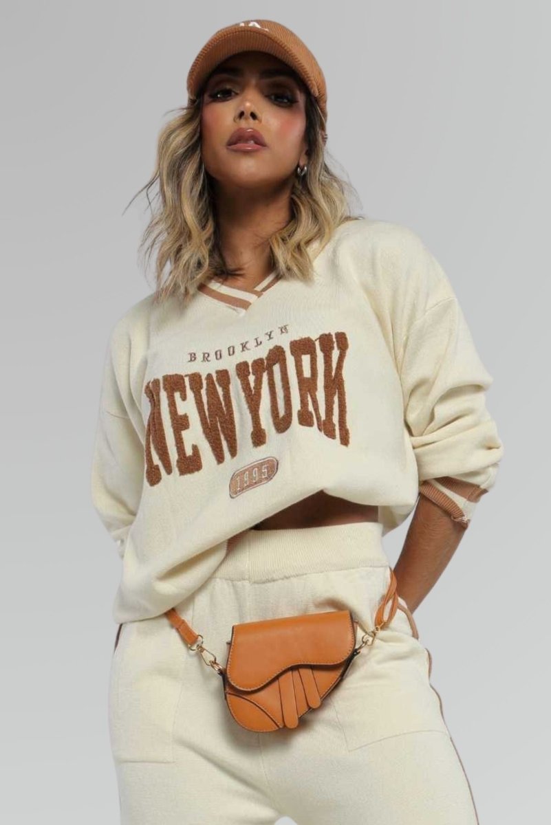 Set beige con aplique 